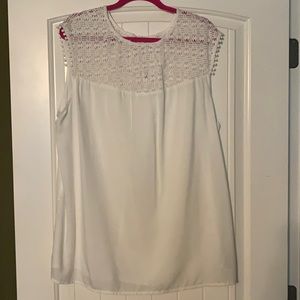 White sleeveless blouse